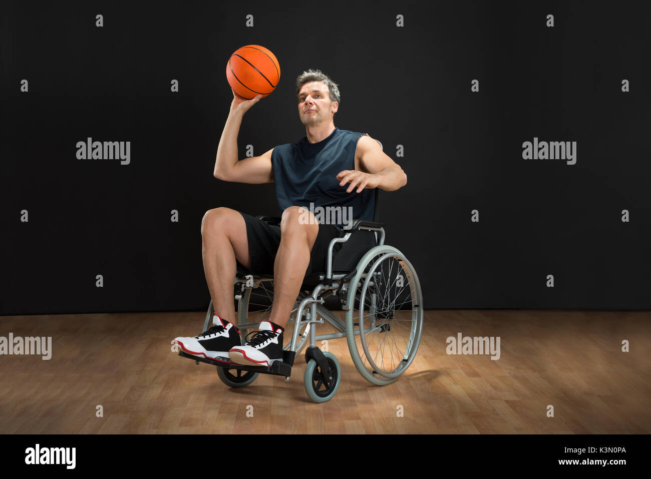 Disabled Basketball Player On Wheelchair Throwing Ball Stock Photo Alamy
