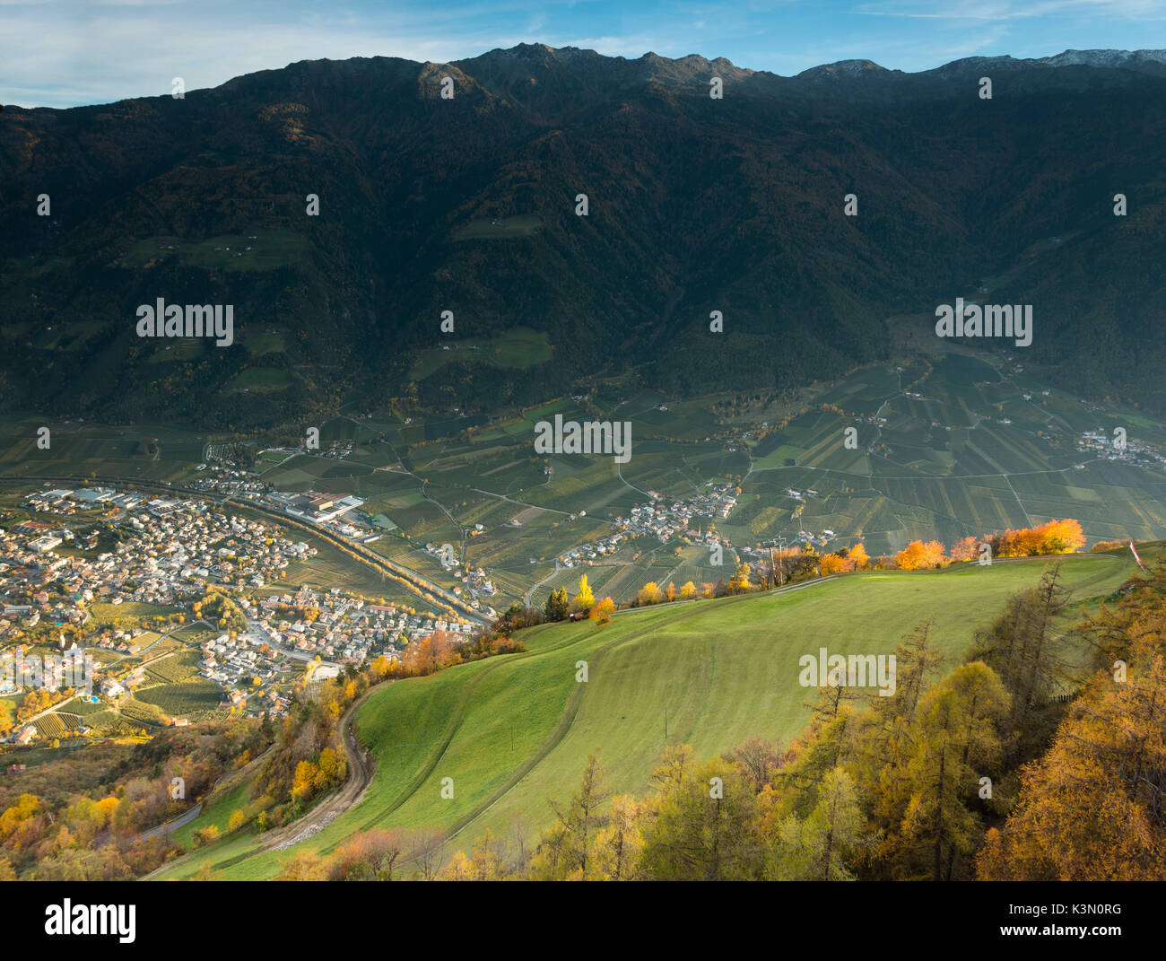 an autumnal aerial view of the village of Naturns in the sunset light, Vinschgau, Bolzano province, South Tyrol, Trentino Alto Adige, Italy, Europe Stock Photo