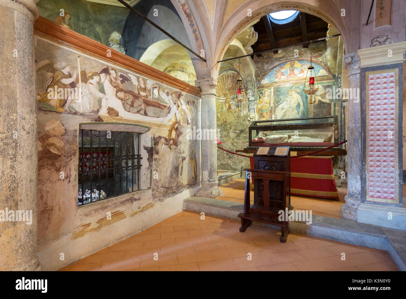 The corpse and tomb of Beato Alberto inside the church of Santa Caterina del Sasso, Leggiuno, Varese Province, Lombardy, Italy. Stock Photo