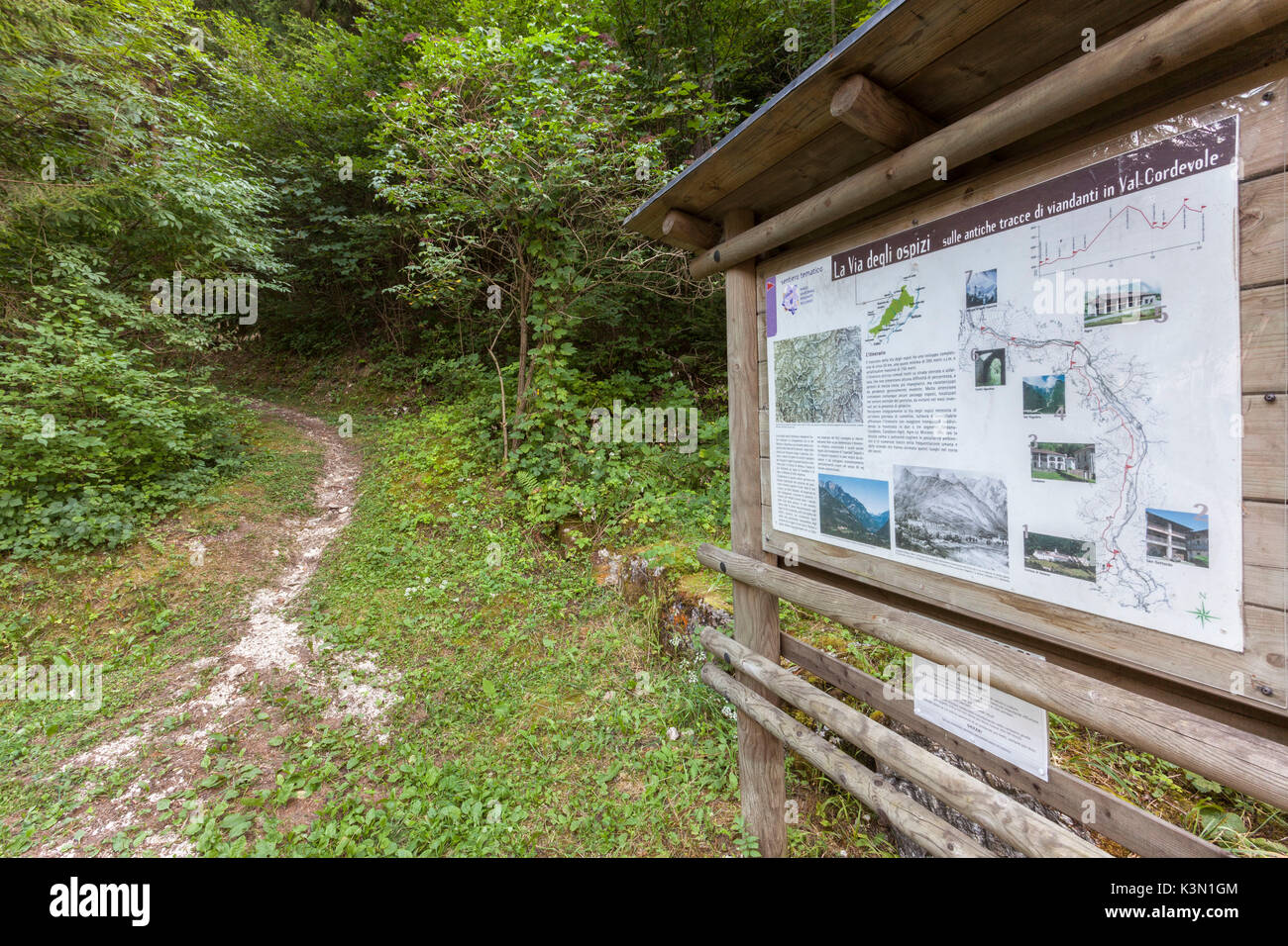 Information board at the beginning of the thematic path 'The Way of the Hospices'; a path of 17 kilometers starting from the Mining Center of Valle Imperina to reach the Certosa di Vedana crossing the canal Cordevole. Dolomiti Bellunesi National Park Stock Photo