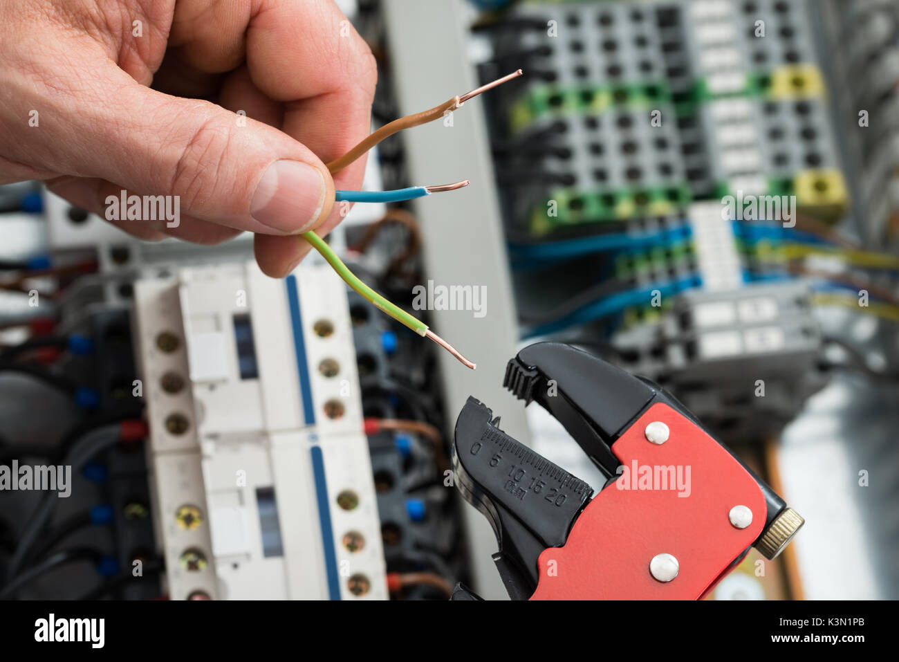 Close-up Of A Technician Holding Cables And Work Tool Stock Photo