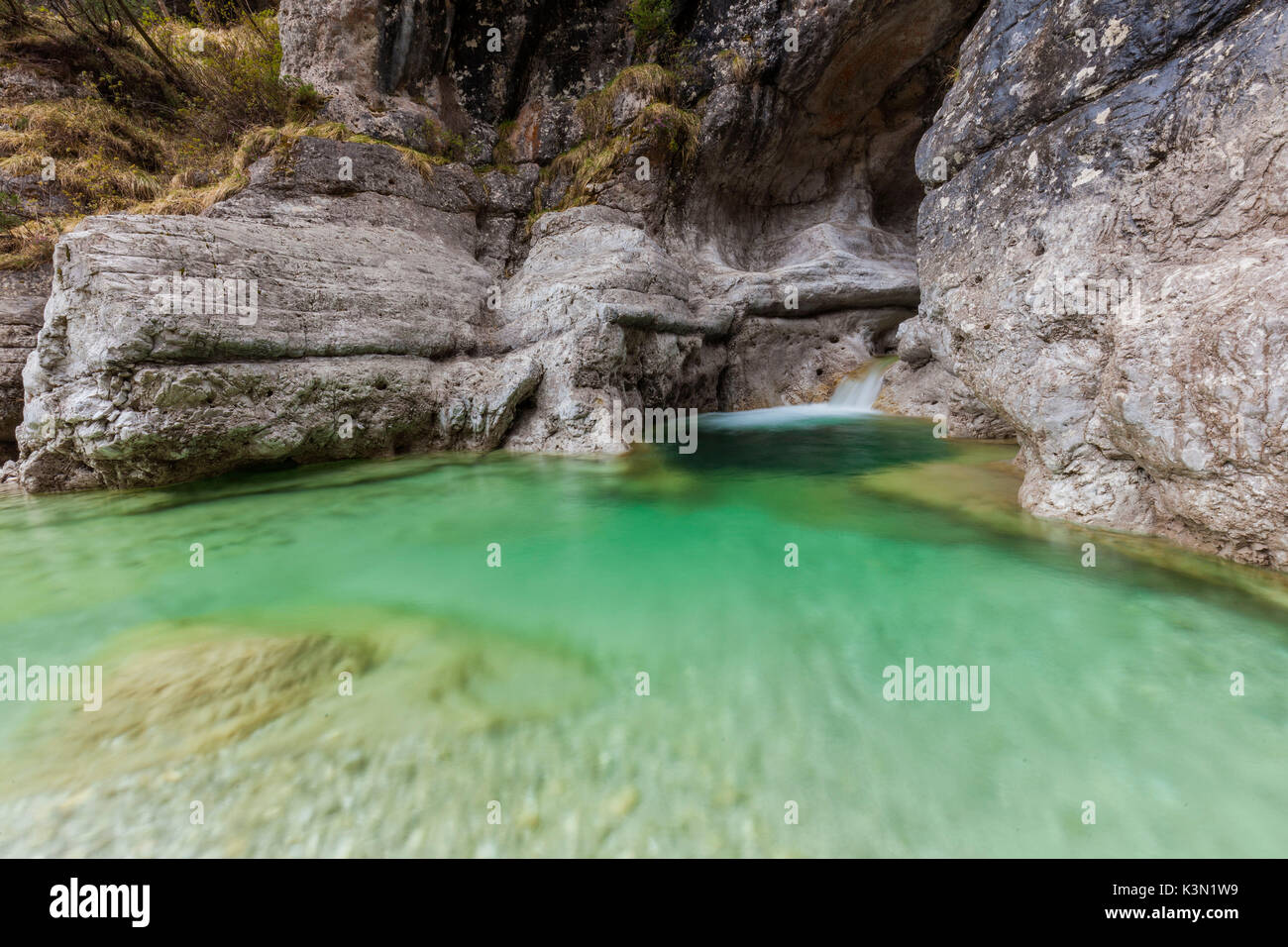 Erosion in the deep canyon carved by the water at the beginning of the val Pegolera, Monti del Sole, Dolomiti Bellunesi National Park, Belluno, Veneto, Italy Stock Photo