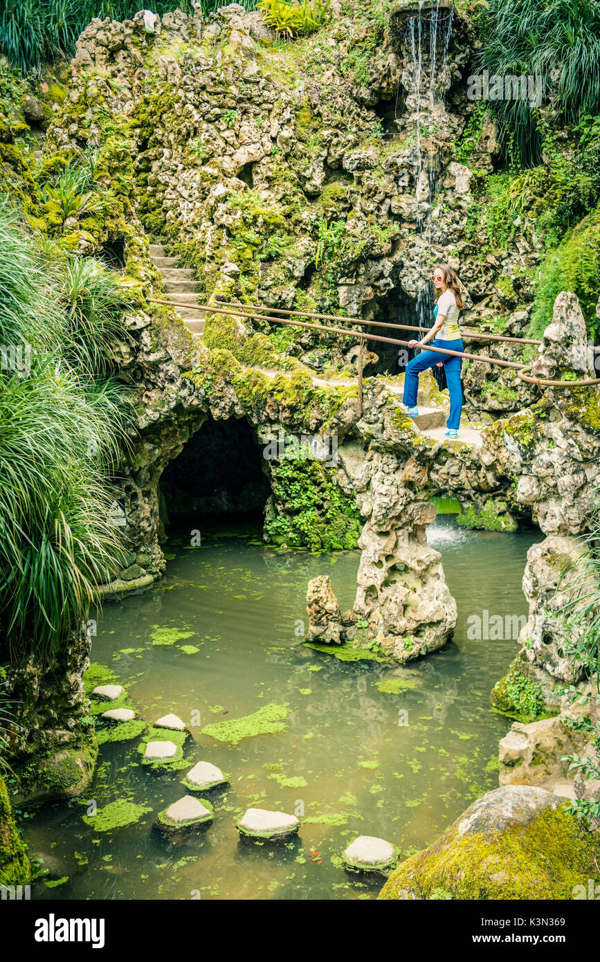 Woman crossing bridge medieval hi-res stock photography and images - Alamy