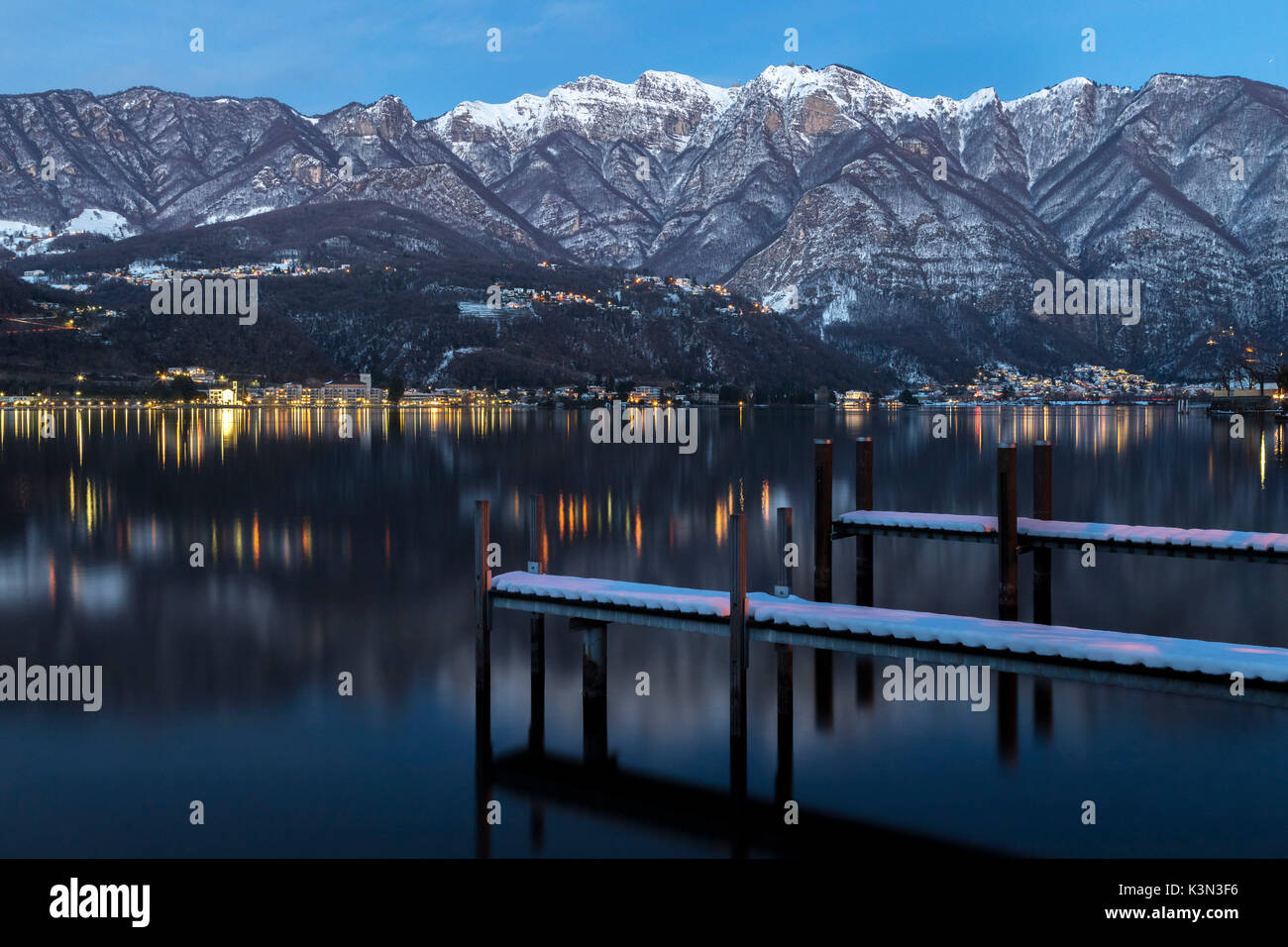 Piers In Front Of Monte Generoso After A Winter Sunset Riva San Stock Photo Alamy