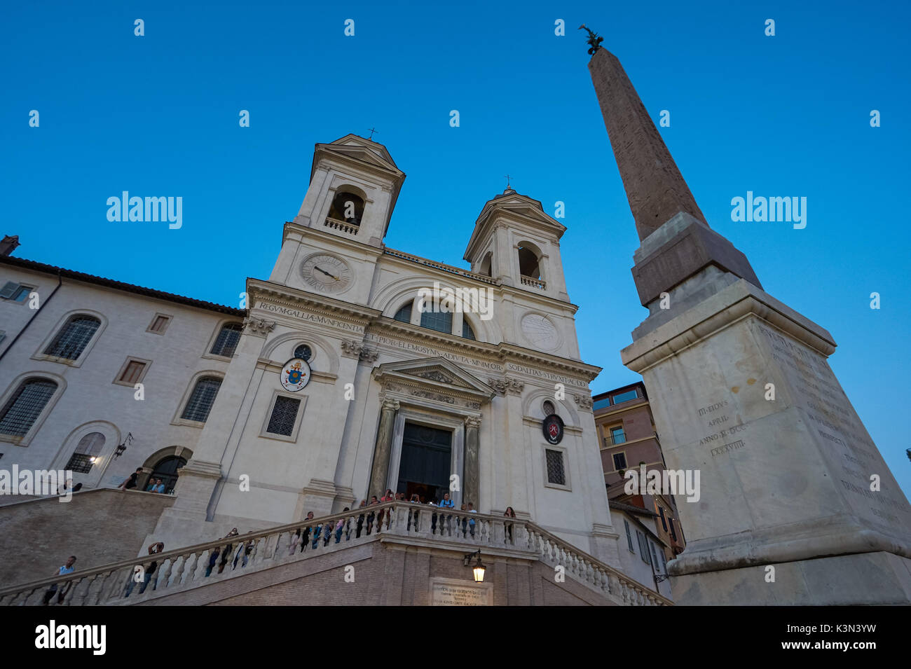 The church of the Santissima Trinità dei Monti and Sallustiano Obelisk near the Spanish Steps in Rome, Italy Stock Photo