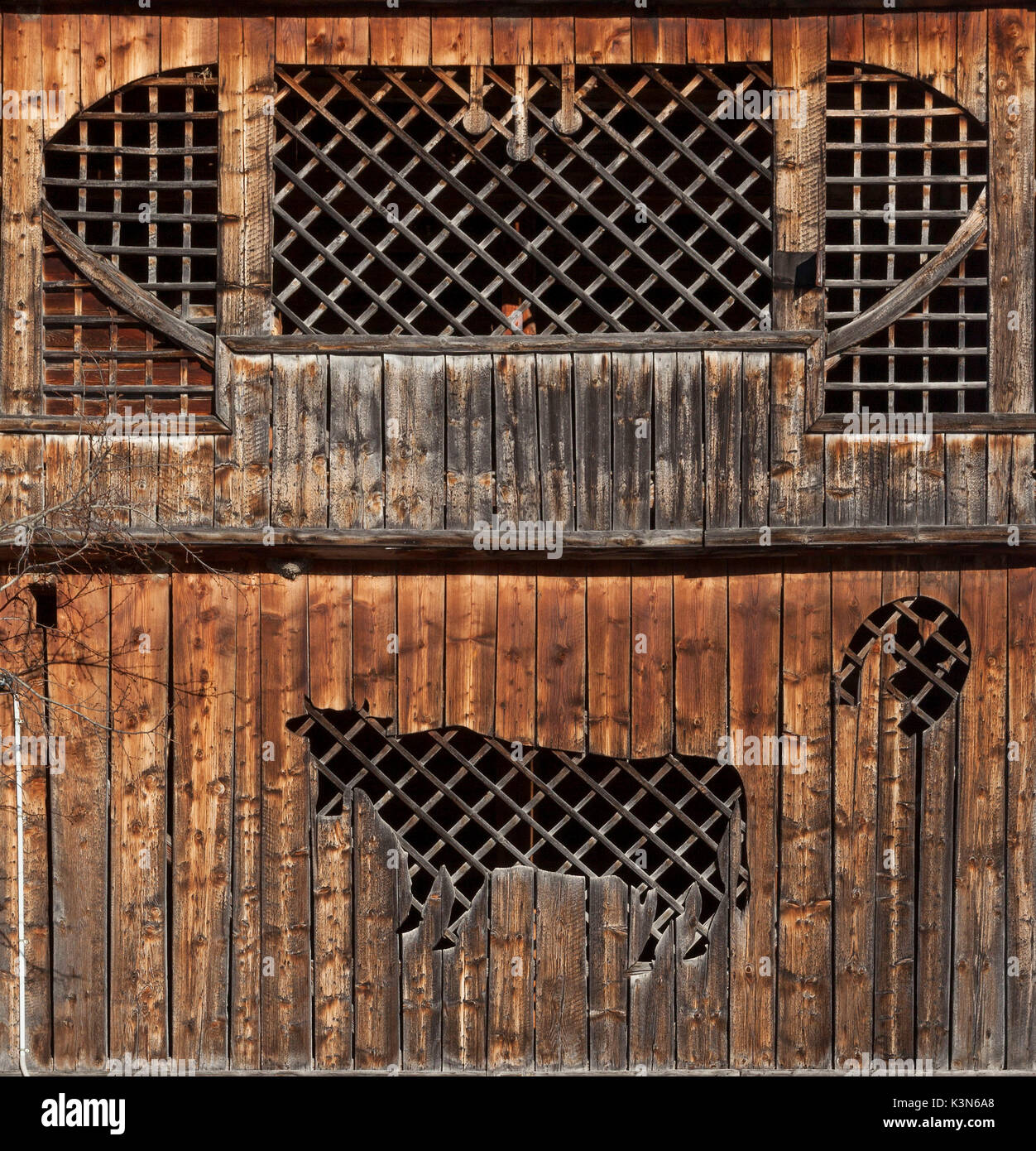 Europe, Italy, Veneto, Belluno, Zoldo. Detail on the facade of a characteristic wooden barn in Dolomites Stock Photo