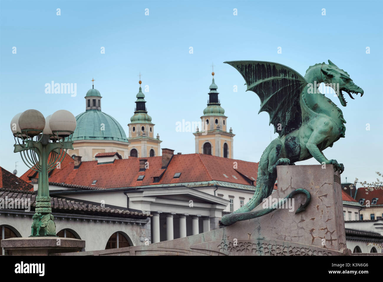 Europe, Slovenia, Ljubjana. The dragon bridge and the Cathedral of Saint Nicholas Stock Photo