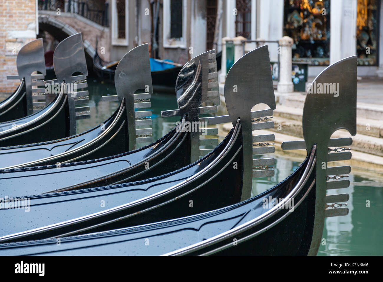 Europe, Italy, Veneto, Venice. Gondolas lined with typical prow called 'ferro' Stock Photo