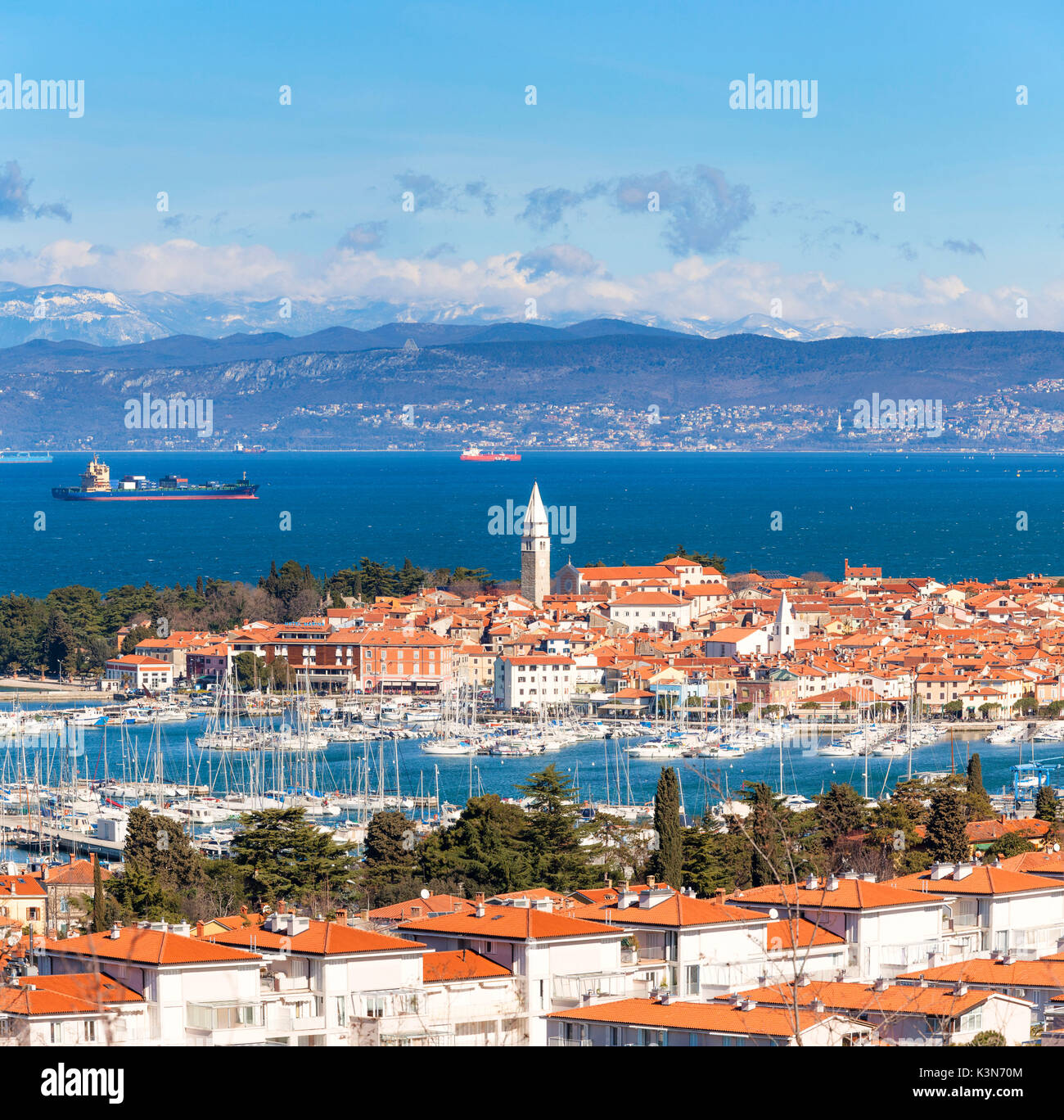 Europe, Slovenia, Istria. Panoramic view towards the bay and marina of Izola, Slovenian Littoral Stock Photo