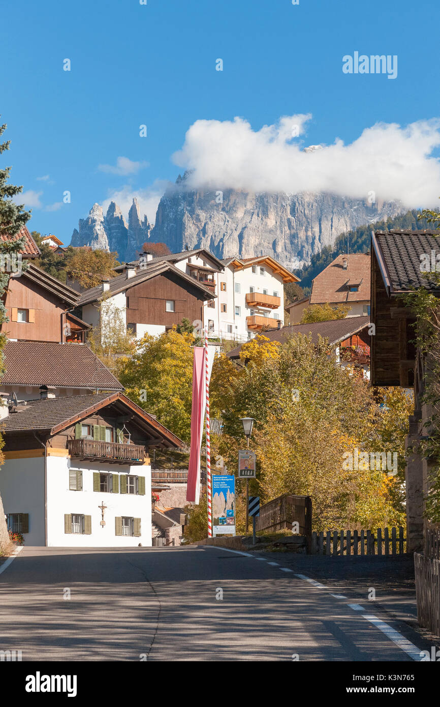 Europe, Italy, South Tyrol, Bolzano. The village of Tires with Torri del Vaiolet in the background, Dolomites Stock Photo