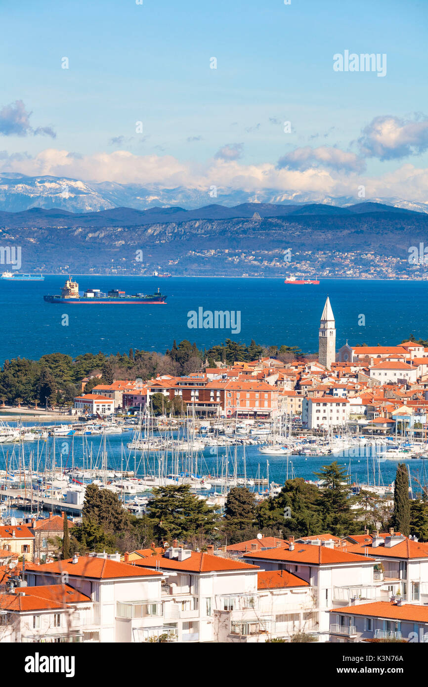 Europe, Slovenia, Istria. Panoramic view towards the bay and marina of Izola, Slovenian Littoral Stock Photo