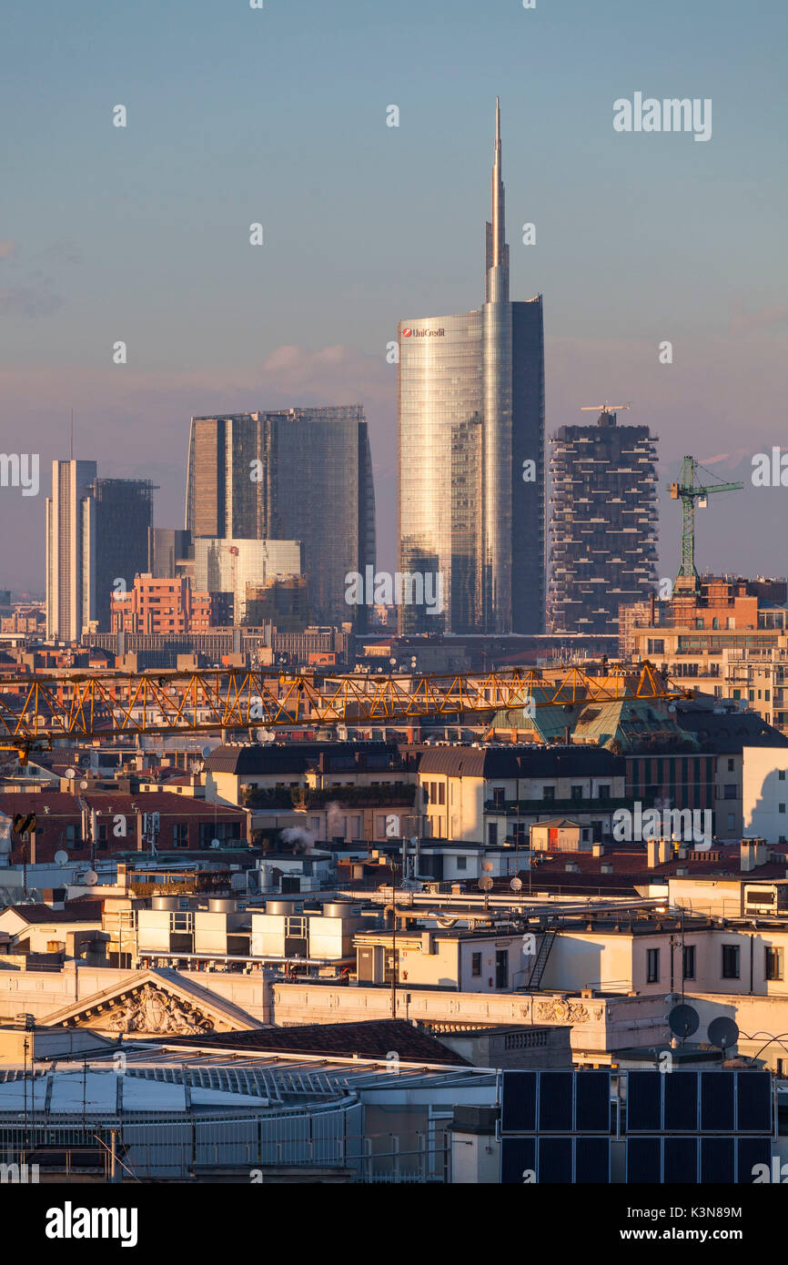 Milan, Lombardy, Italy. A view of city from the top of Cathedral at sunset. Stock Photo