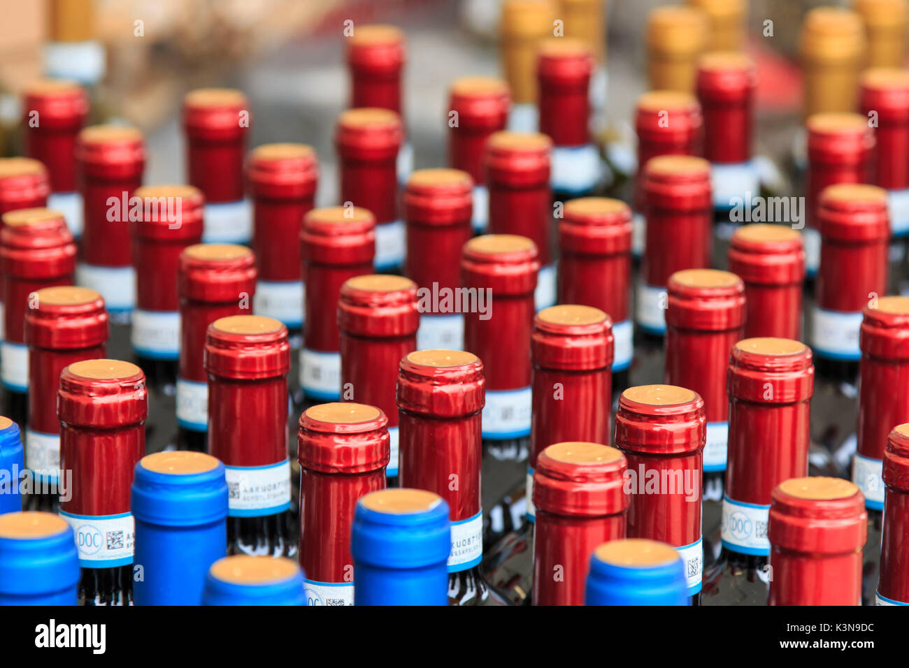 Closeup of many bottles of wine at the truffle fair of Moncalvo, Italy Stock Photo