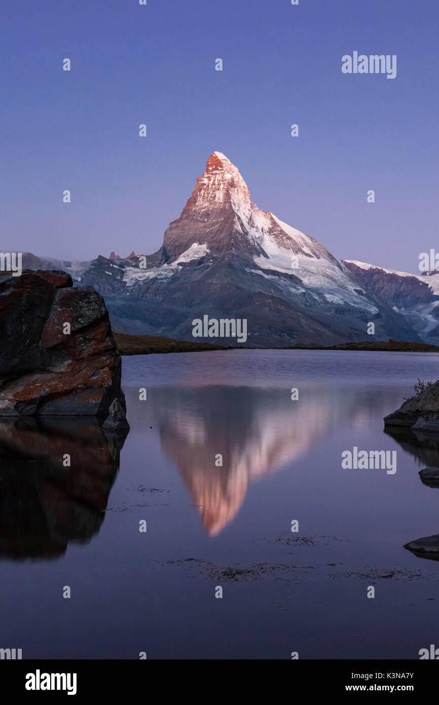 The Matterhorn's reflection in the Lake Stallisee at sunrise, Zermatt valley, Valais-Wallis Canton, Switzerland Stock Photo