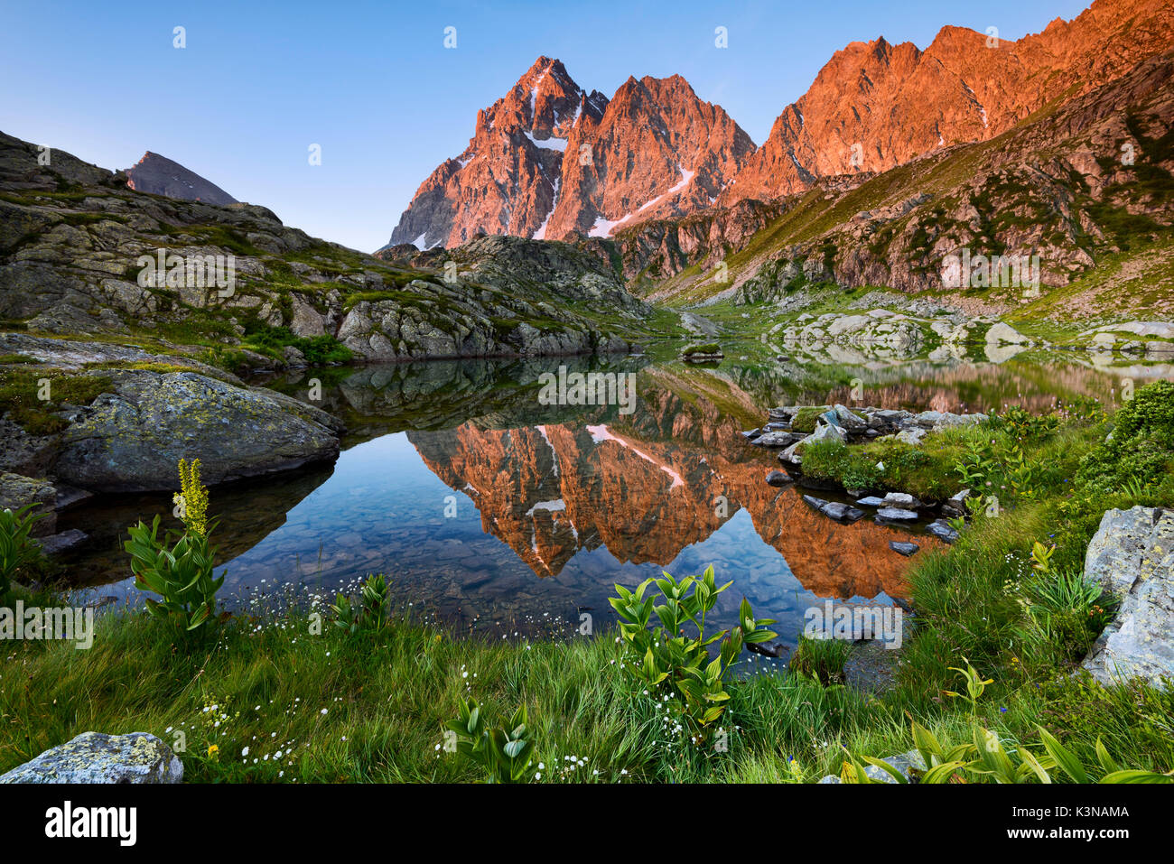 Italy, Piedmont, Cuneo District, Po Valley, Crissolo - Summer sunrise at Superiore Lake Stock Photo