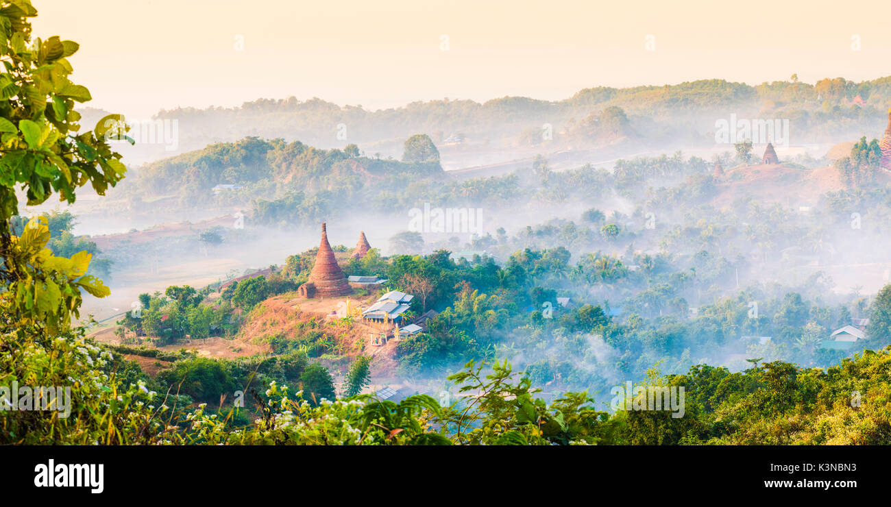 Mrauk-U, Rakhine state, Myanmar. Mrauk-U valley in a foggy sunrise seen from the Shwetaung pagoda. Stock Photo