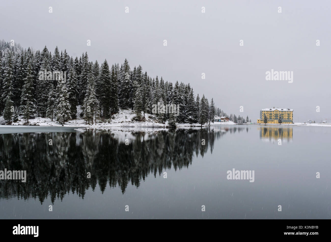 Misurina lake, Dolomites, Veneto, Italy. Misurina is reflected  in the lake Stock Photo