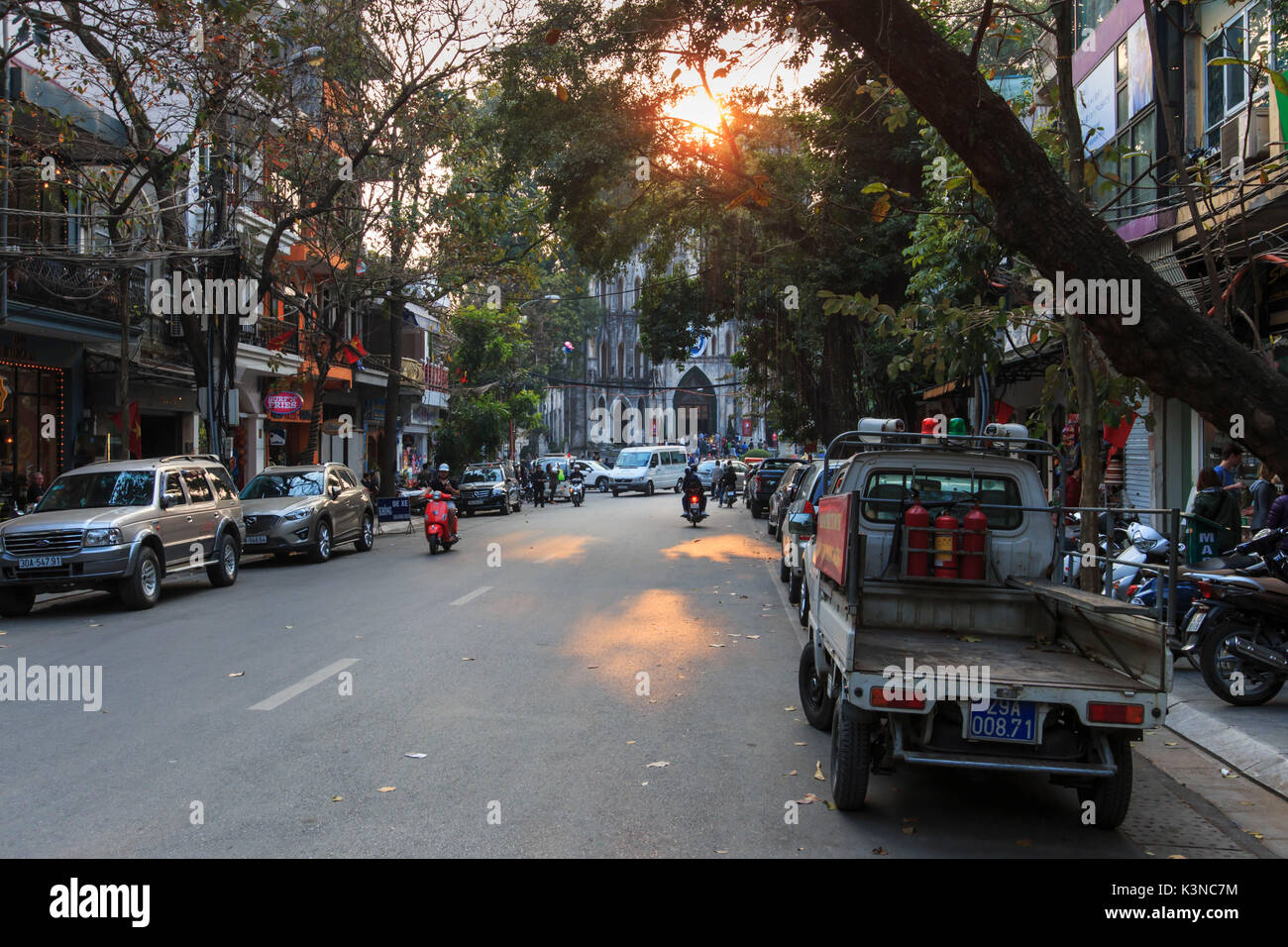 Tourists and local people walking in fron of Saint Joseph Cathedral, the most important church of Hanoi Stock Photo