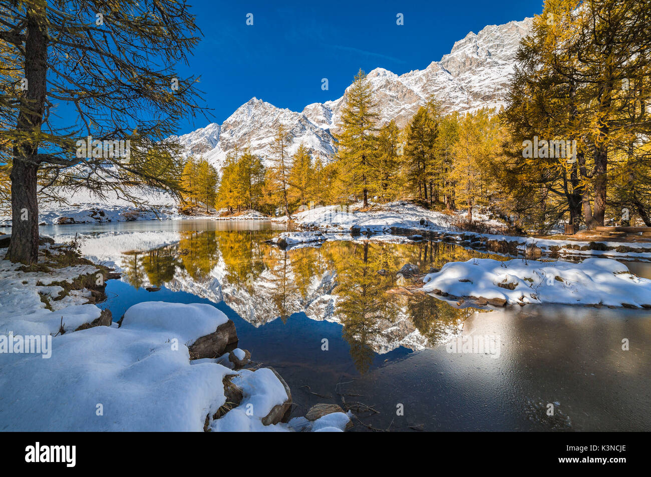 Reflection in the Lake Bleu in autumn (Cervinia, Valtournenche, Aosta province, Aosta Valley, Italy, Europe) Stock Photo
