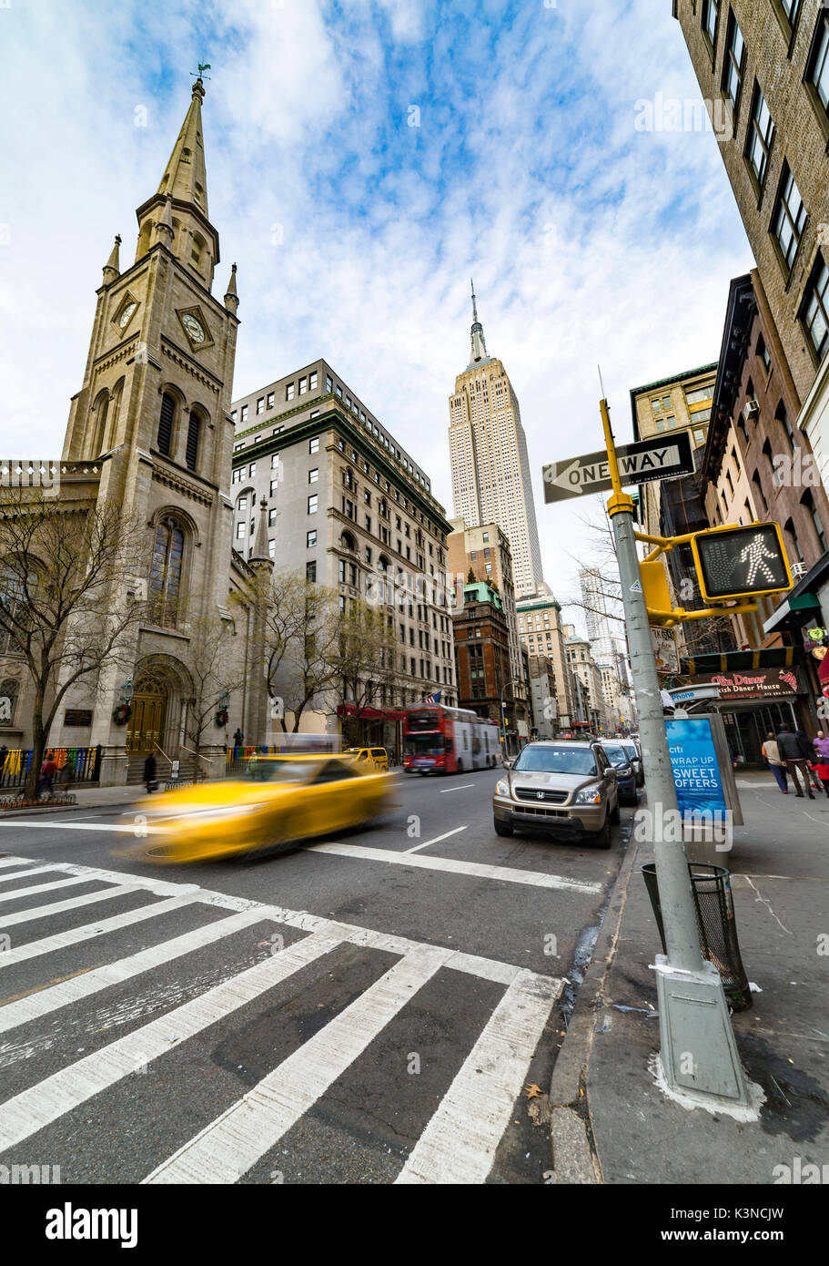 The Marble Church and the Empire State Building from the 5th avenue (Midtown, Manhattan, New York City, New York, United States of America) Stock Photo
