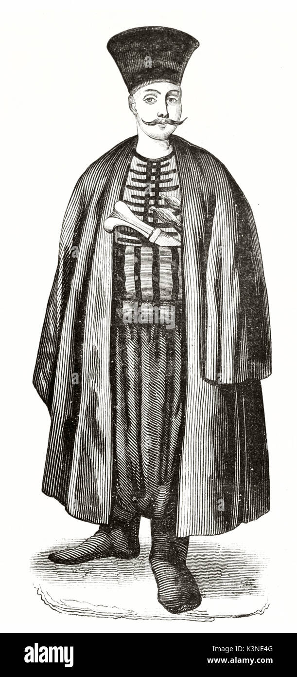 Engraved portrait of an ancient Armenian man in Constantinople with a long cloack and high hat. He also has long moustaches. By unidentified author published on Magasin Pittoresque Paris 1839 Stock Photo
