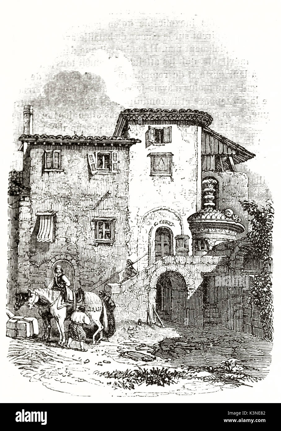 Ancient poor stone house overlooking a courtyard. The Franciscan convent in which Lord Byron lived during his permanence in Athens. By unidentified author published on Magasin Pittoresque Paris 1839 Stock Photo