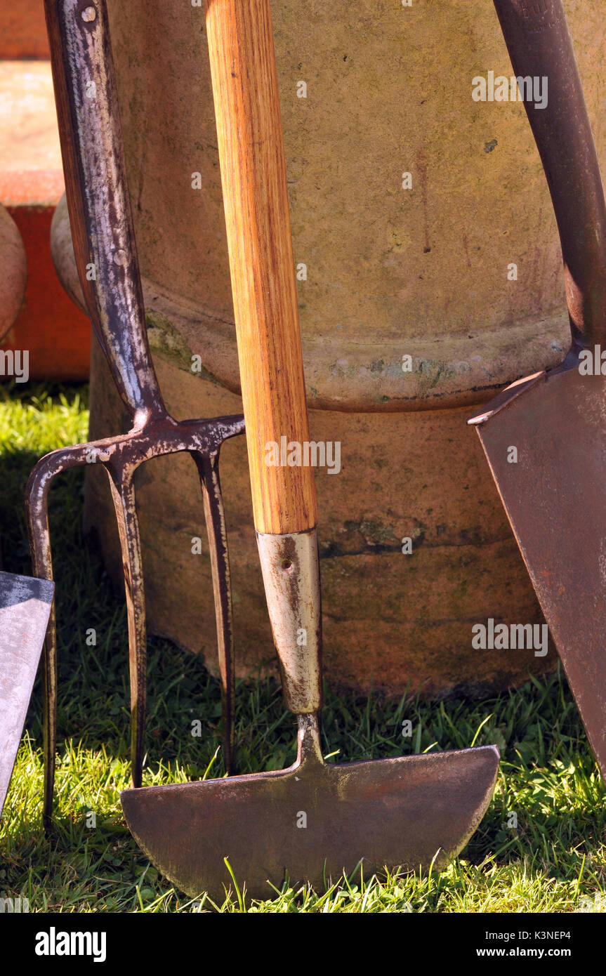 garden tools and axes choppers spades and forks to dig the garden and