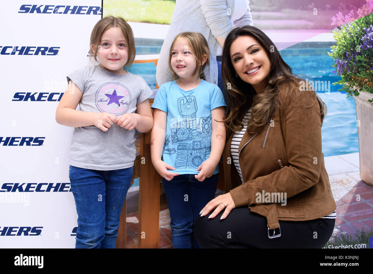 Kelly Brook appears at the Debenhams store in Oxford Street to