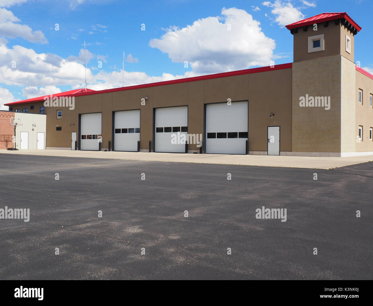 Several large closed garage doors for a small warehouse. Stock Photo