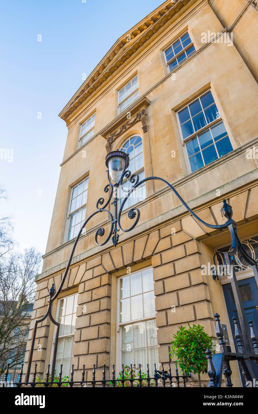 Bath Georgian house,  a lamp above a wrought iron arch sited at the front of a Georgian terraced town house in the centre of Bath, England, UK. Stock Photo