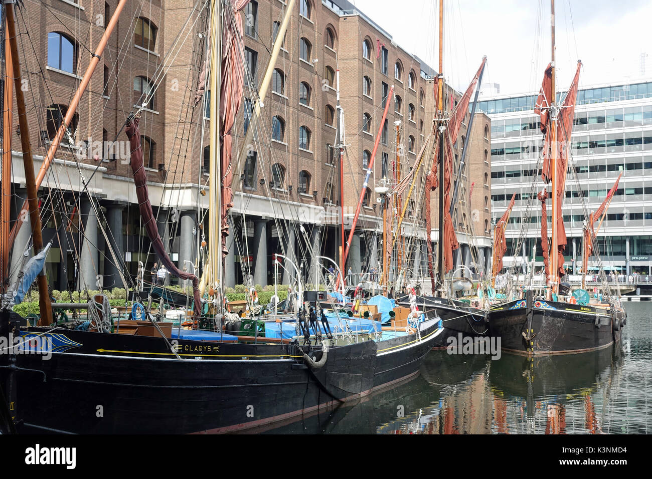 View of Thames Sailing Barges moored in St Katharine Docks in Central London UK Stock Photo