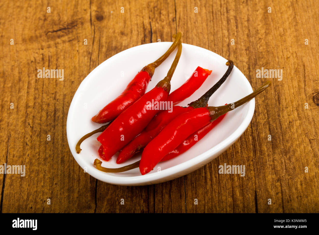 Pickled chili peppers Stock Photo - Alamy