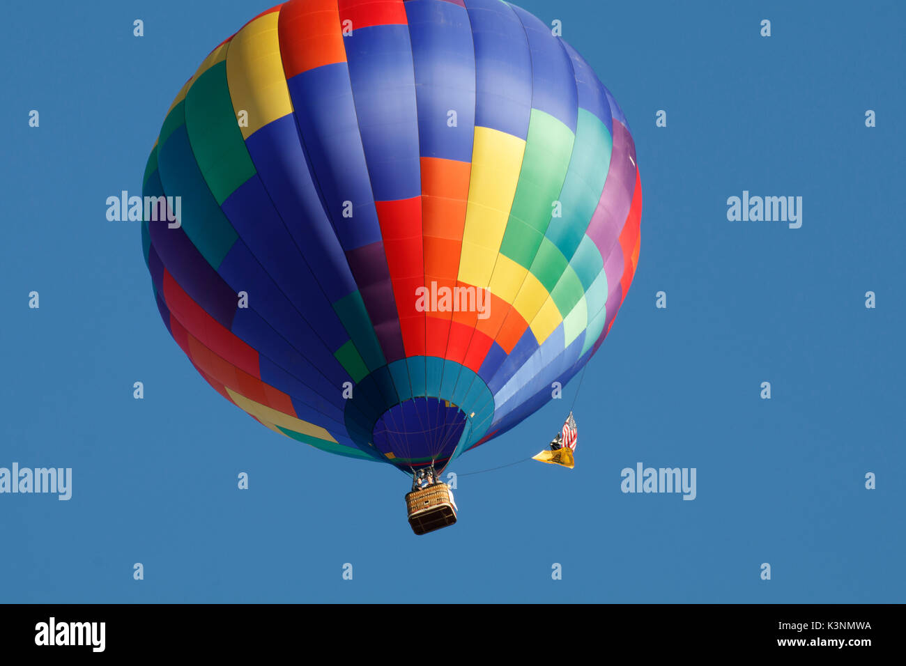 Colorful hot air balloons float through the sky in Albany, Oregon, USA