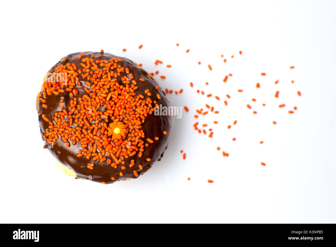 Decorated chocolate donut isolated on white background Stock Photo - Alamy