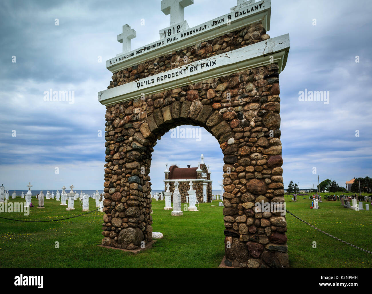 Church Cemetery of Notre Dame du Mont Carmel on the coast of the Atlantic Ocean, New Brunswick, Canada Stock Photo