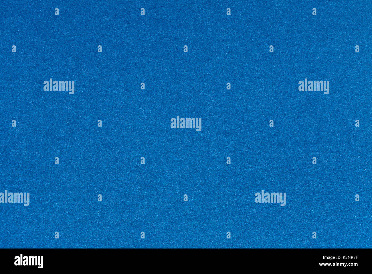 Blue background from a textile material. Stock Photo