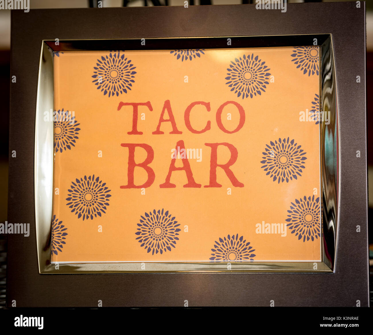 Sign for a party that has the words Taco Bar Stock Photo