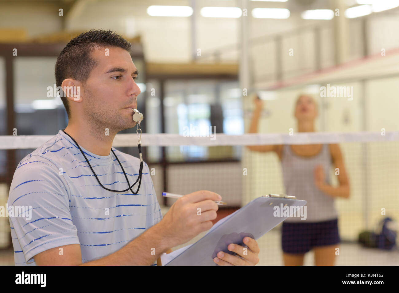 badminton coach or referee Stock Photo Alamy