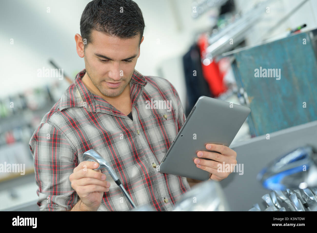 plumber with tablet buying supplies Stock Photo