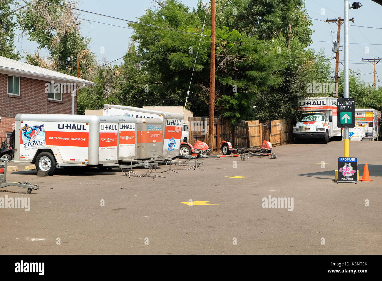 Denver, Colorado, USA - August 7,2017: U-Haul trucks parked at rental place. U-Haul truck is a moving equipment and storage rental company. Stock Photo