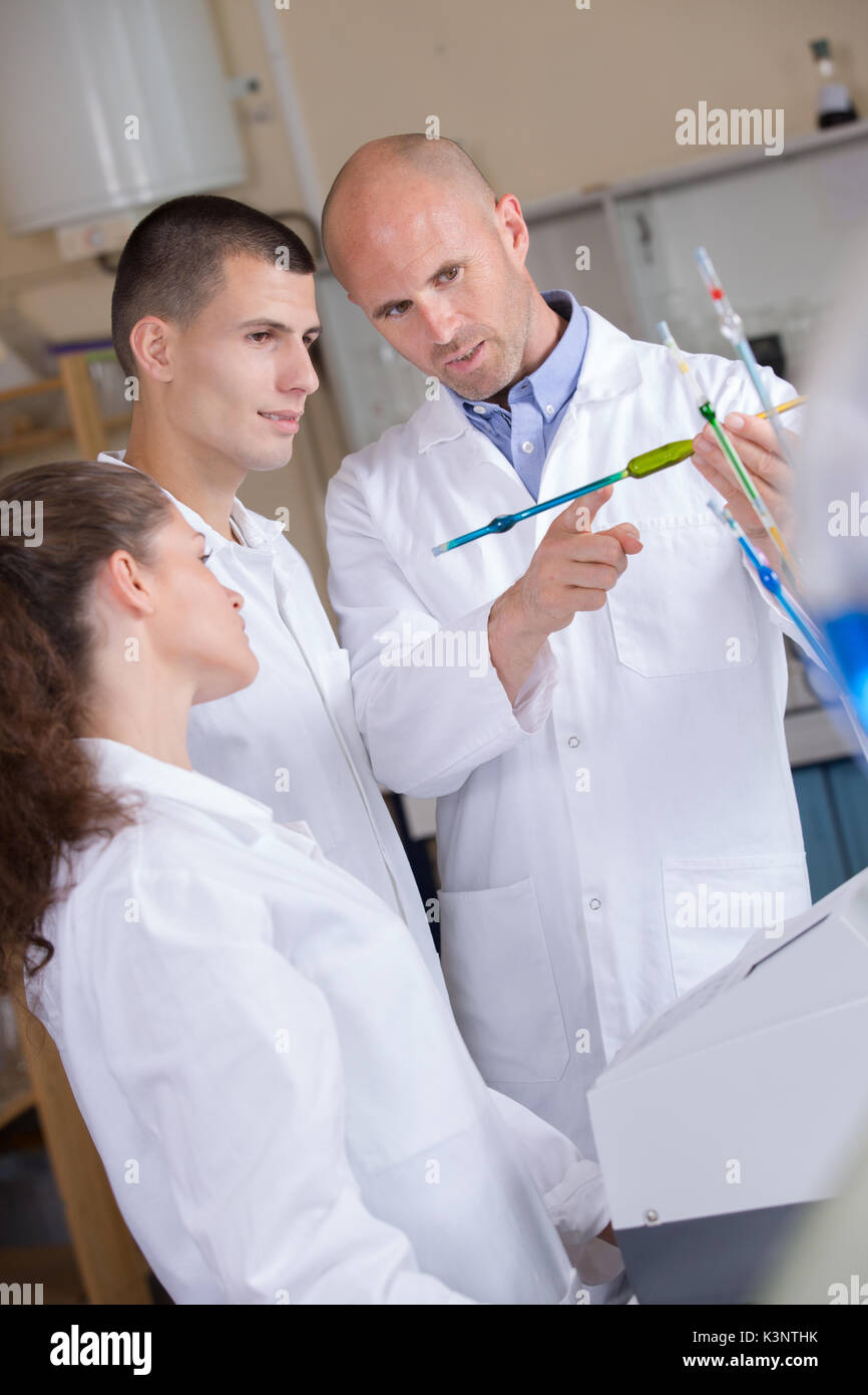 Chemistry class student doing experiment hi-res stock photography and ...