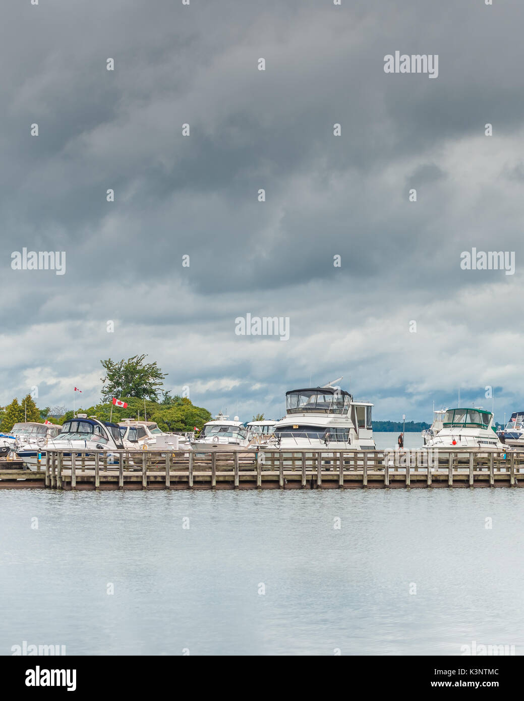 Pleasure boats safely docked at the Port of Orillia Ontario Canada as late summer storms roll through. Stock Photo