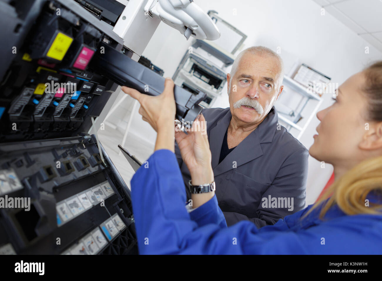 Fixing Copy Machine Tehcnician hi-res stock photography and images - Alamy