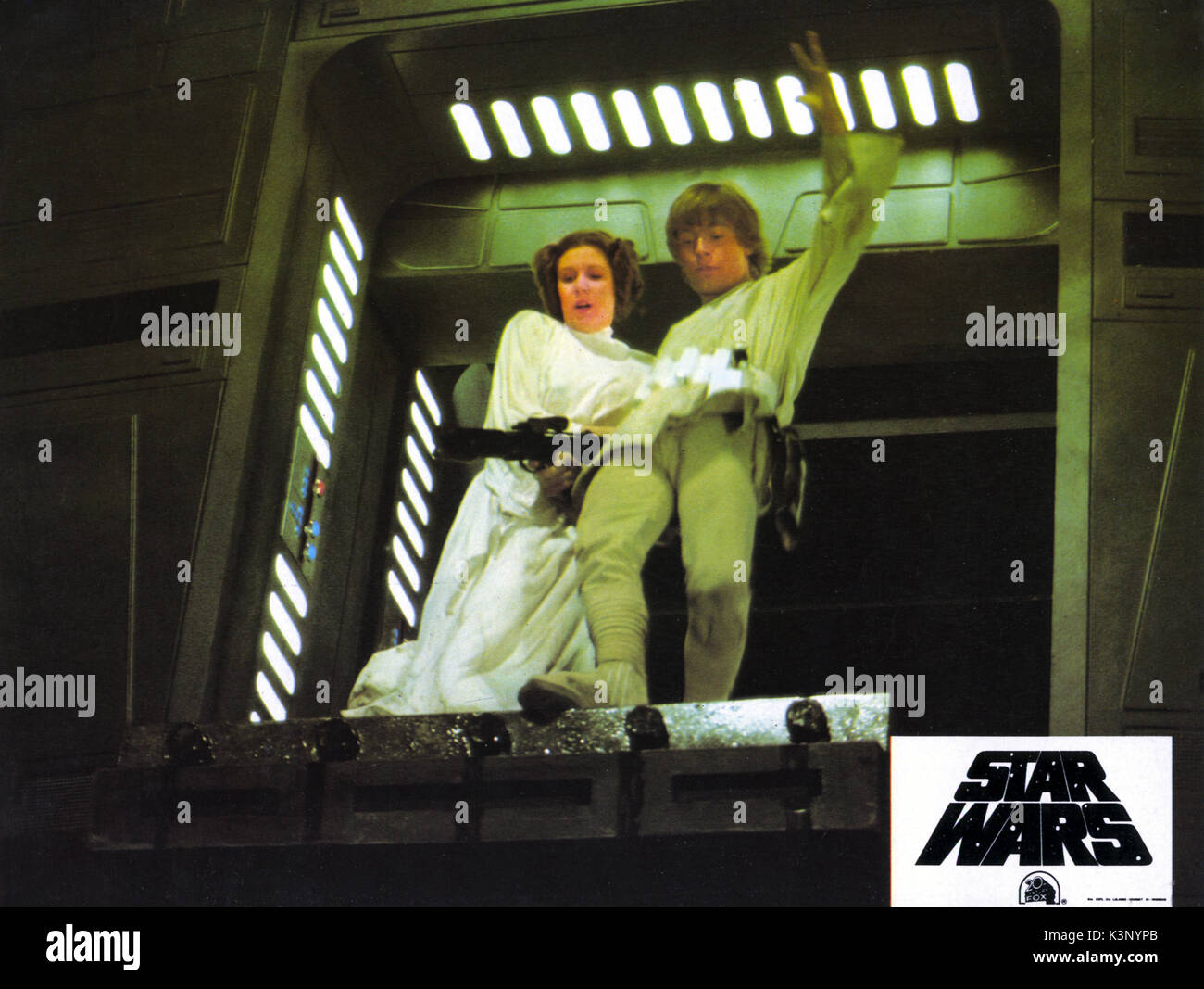 STAR WARS: EPISODE IV - A NEW HOPE [US 1977] CARRIE FISHER as Princess Leia, MARK HAMILL as Luke Skywalker     Date: 1977 Stock Photo