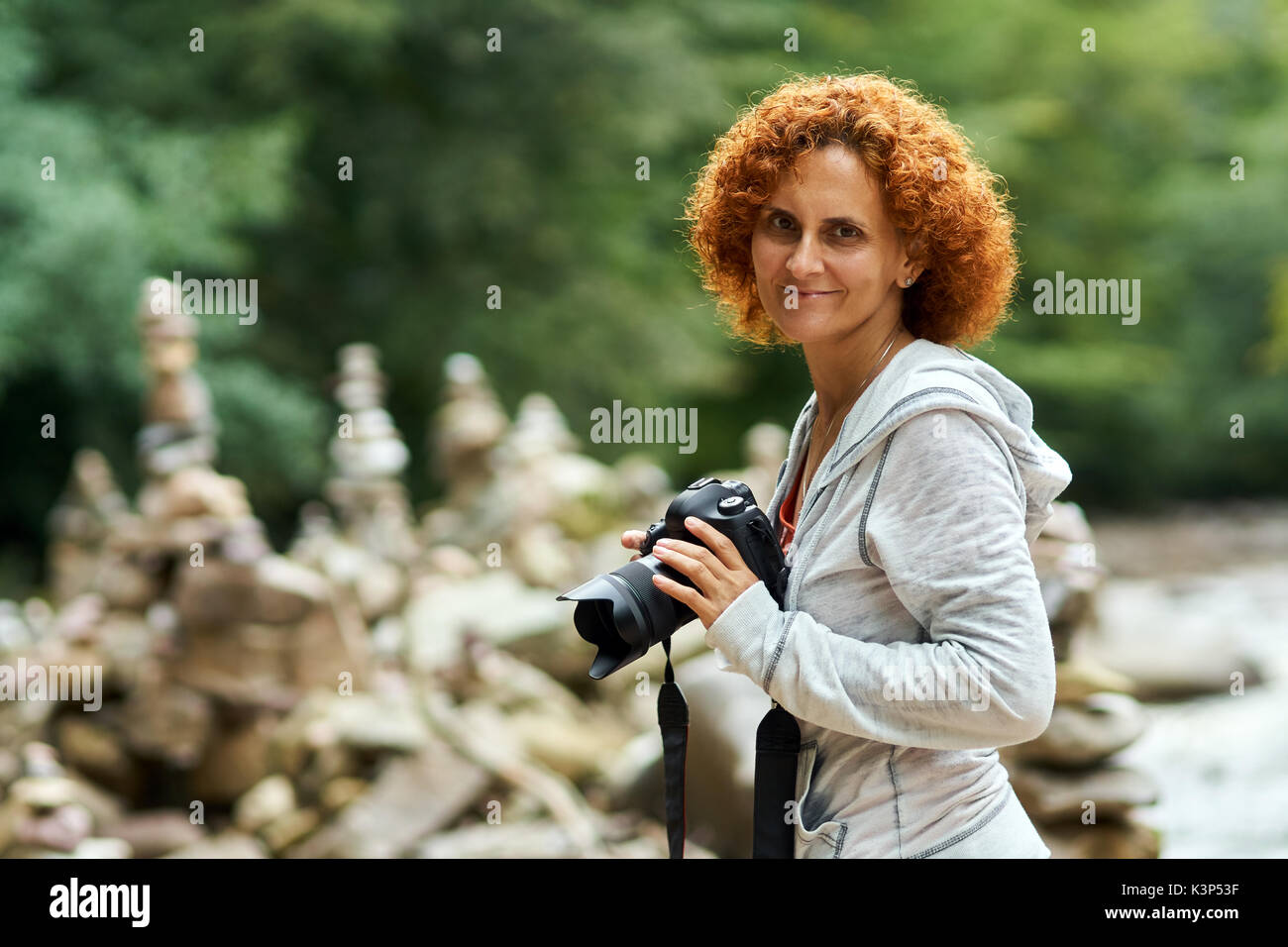 Tourist lady camera hiking hi-res stock photography and images - Alamy