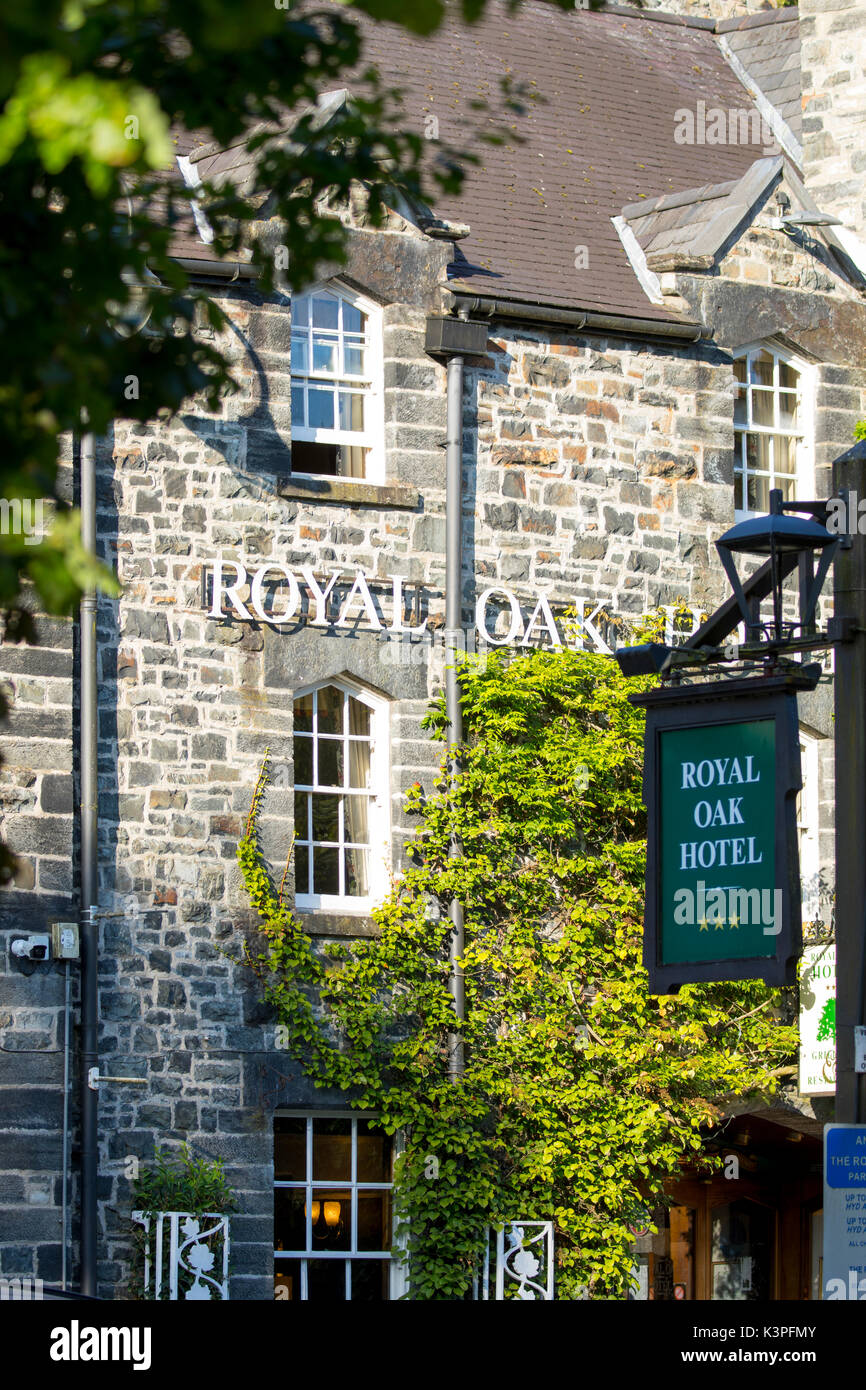 The picturesque Victorian three start hotel  Royal Oak Hotel on a summers morning with lush green ivy on the outside of the building, Betws-y-Coed, Stock Photo