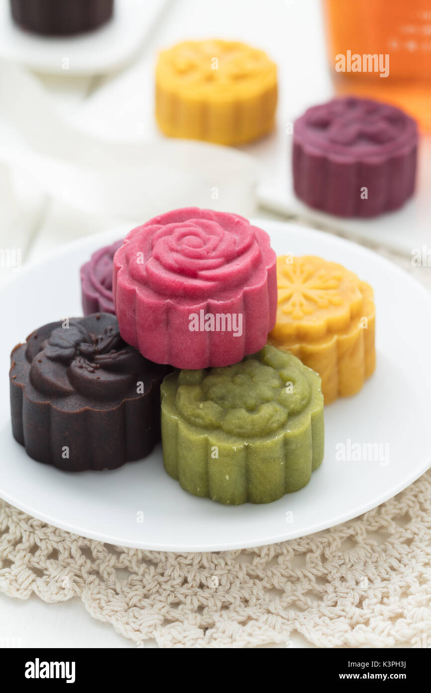 Delicious Mooncake, a kind of traditional Chinese Snack for Mid-Autumn Festival on the Table. Stock Photo