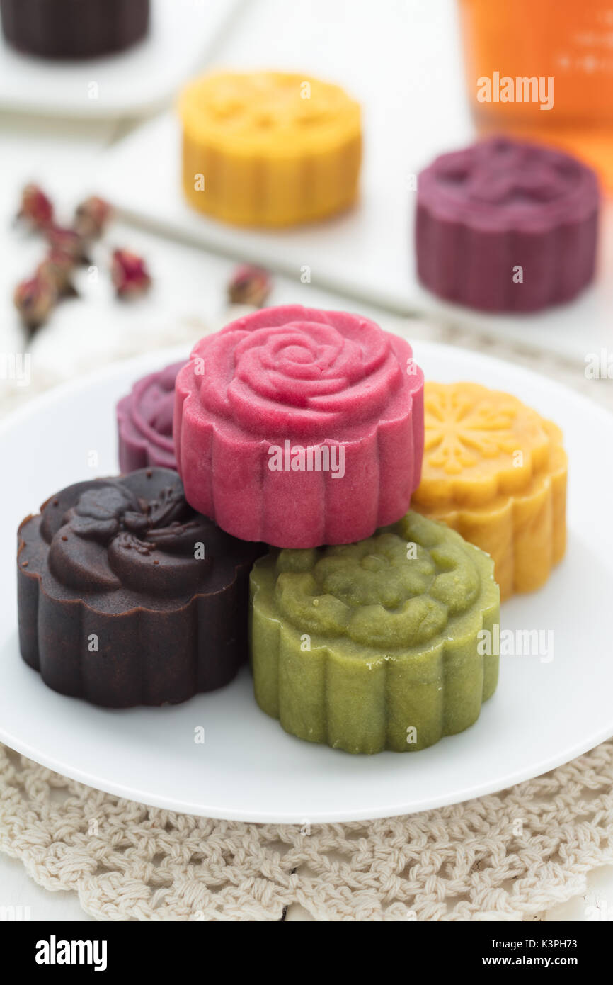 Delicious Mooncake, a kind of traditional Chinese Snack for Mid-Autumn Festival on the Table. Stock Photo