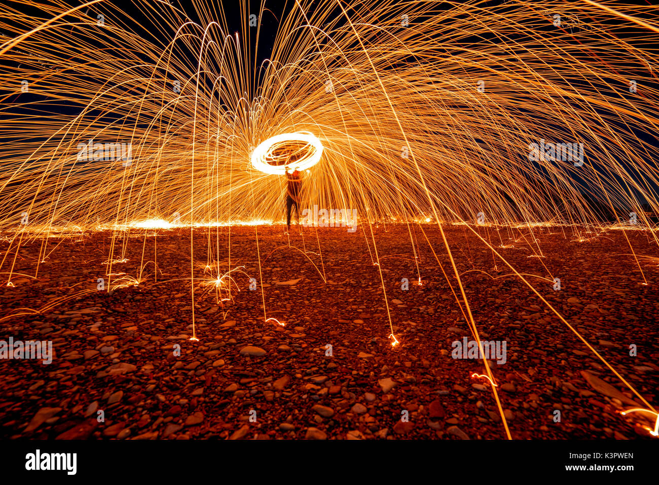 man who practices the technique of steelwool, piacenza, emilia romagna, italy Stock Photo