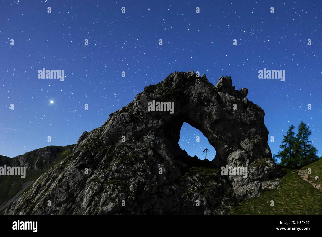 The natural Arch of Porta di Prada, on Grigna Settentrionale, by nigth,  Province of Lecco, Lombardy, Italy Stock Photo - Alamy